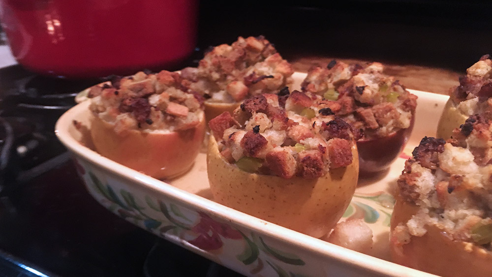 Baked Golden Delicious apples with stuffed with sausage filler