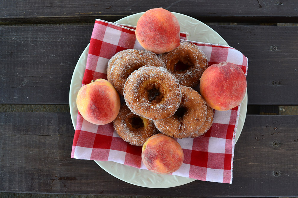Peach cider donuts and fresh peaches