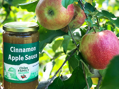 Glass Jar of Cinnamon Apple Sauce by Chiles Family Orchards