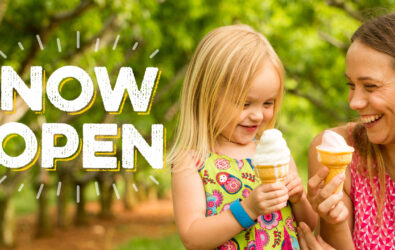Chiles Peach Orchard now open; mom and daughter enjoy soft-serve ice cream