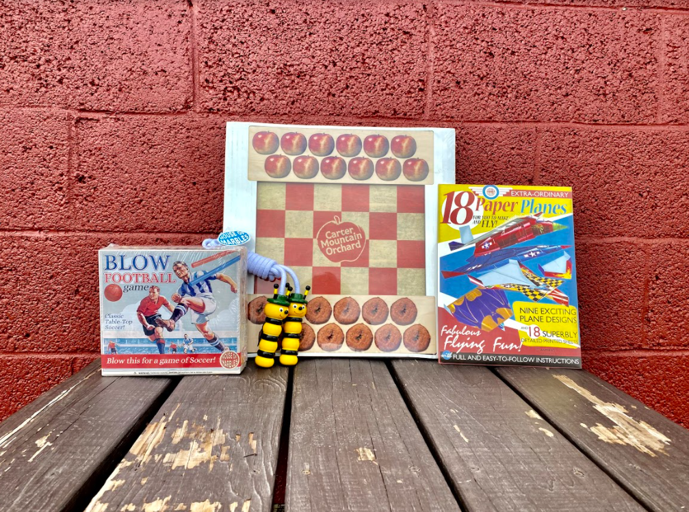 Checkers, blow football, paper planes, and other games from Country Store