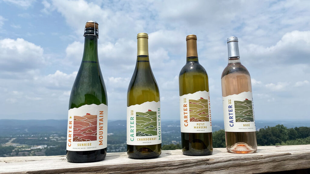 Carter Mountain wine bottles with a scenic view