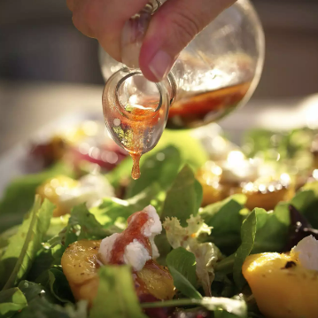 Grilled peach salad with chipotle-raspberry vinaigrette from southern living