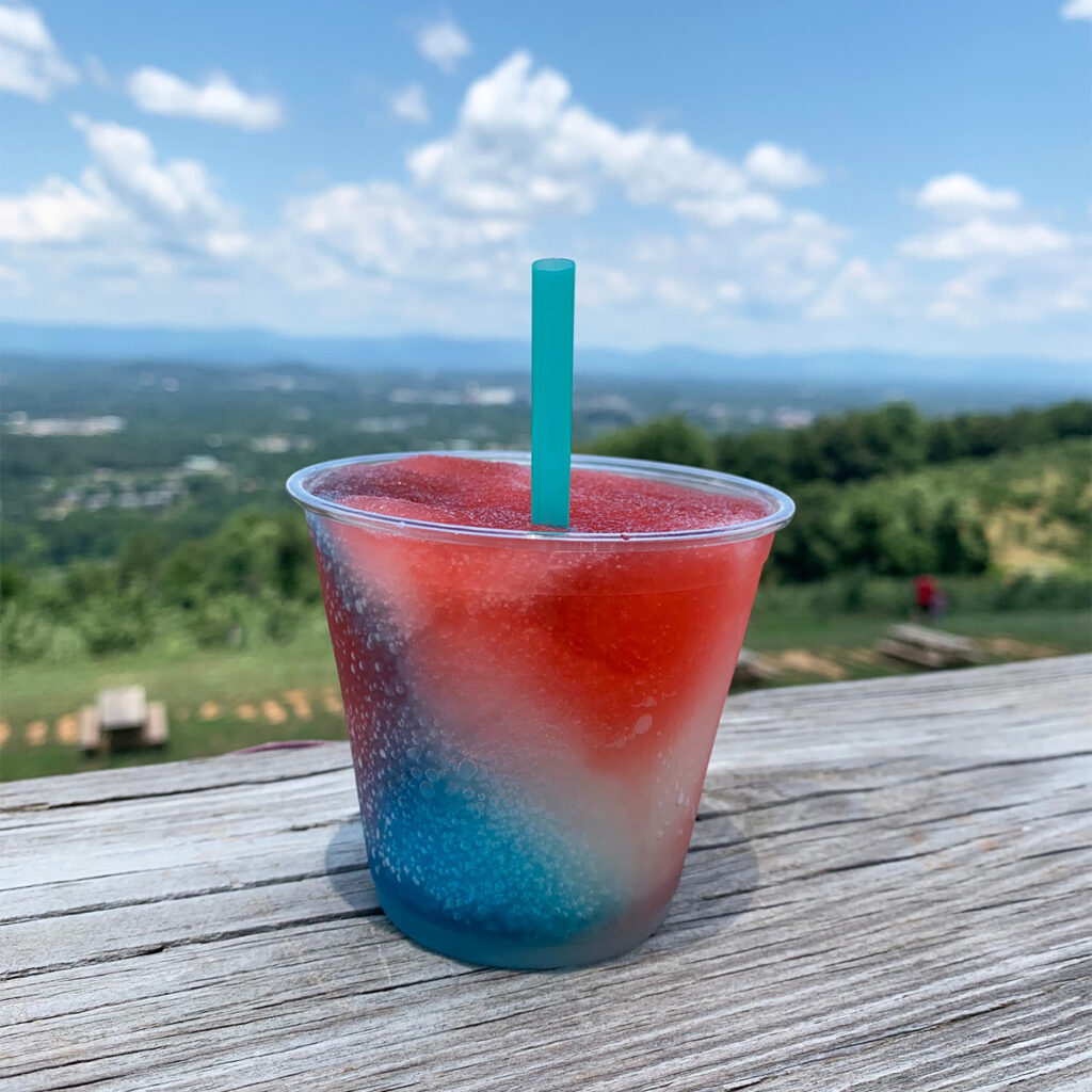 Patriotic wine slushie with red, white, and blue colors