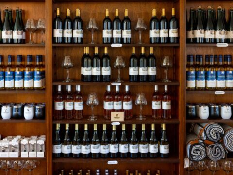 Wine bottled lined up on Chiswell's tasting room display