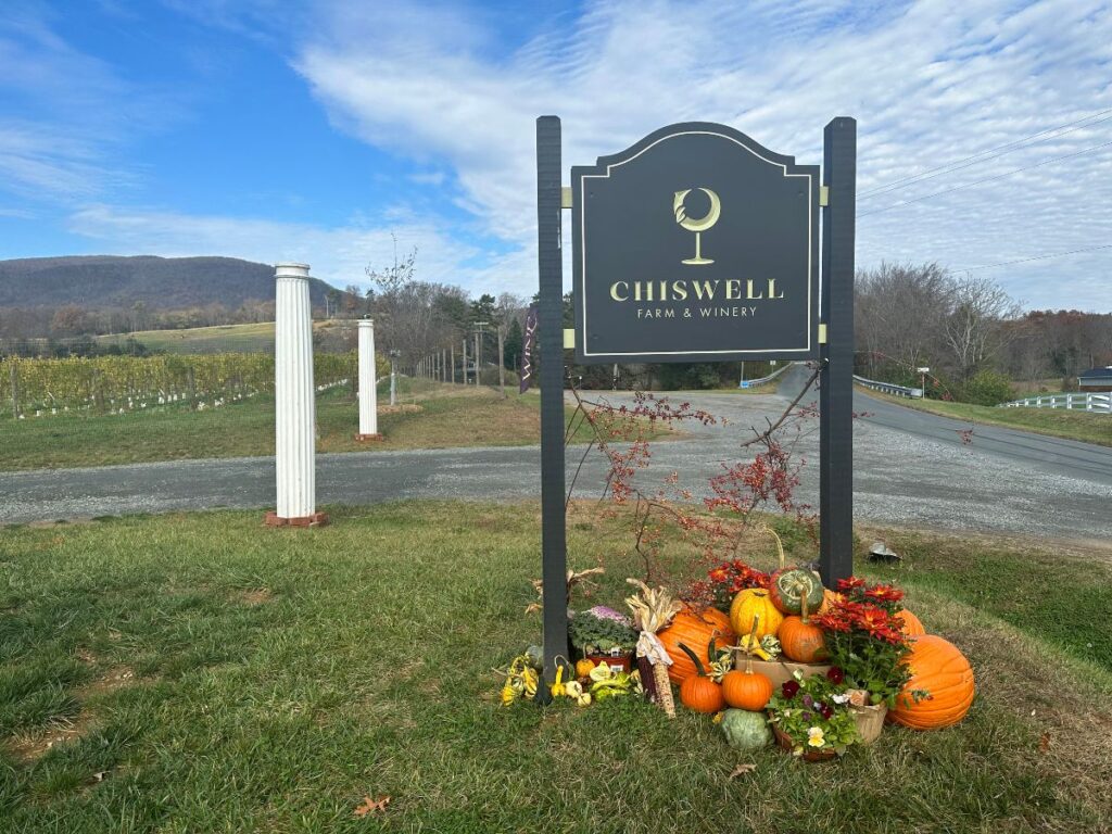 Sign with pumpkins at Chiswell Farm & Winery