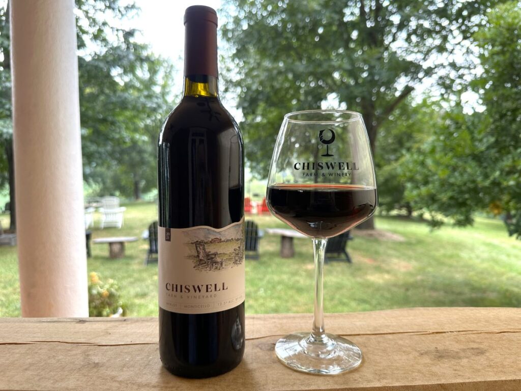 2021 Merlot bottle and glass at Chiswell Winery