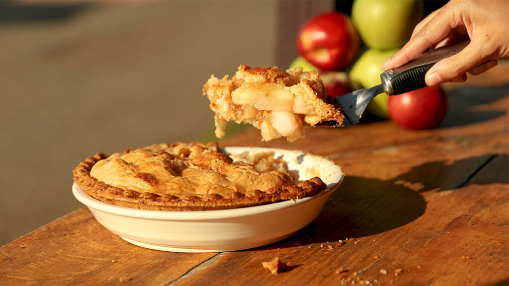 Slice of a Carter Mountain Orchard apple pie raised from the pie plate