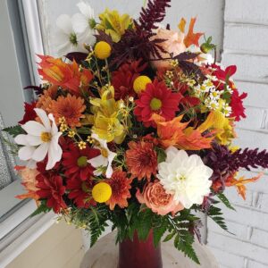 A winter flower arrangement made by Dogwood Tree.