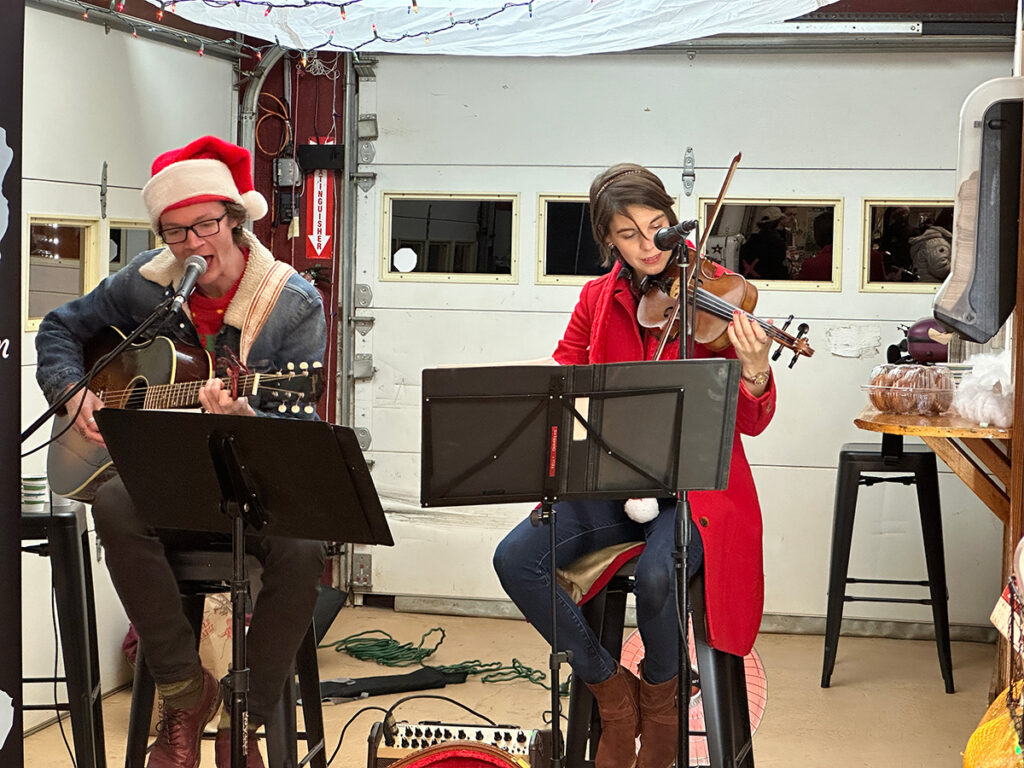 Theocles and Kelly Chambers performing at Carter Mountain Orchard.