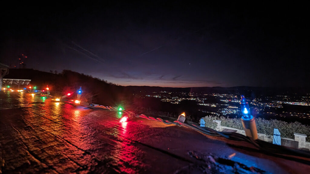 String lights at dusk from Carter Mountain Orchard.