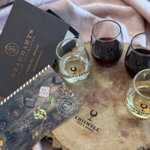 Wine flight featuring 4 wines and Gearharts Fine Chocolates.