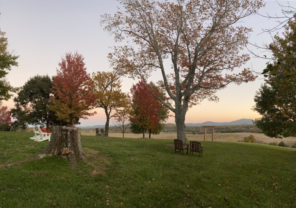 An evening fall view from a farm hillside.