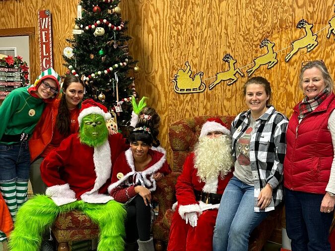 Chiles family and staff with Santa