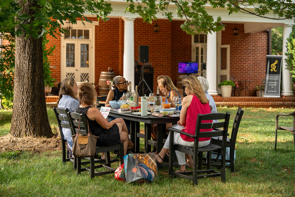 A group at a table during music trivia