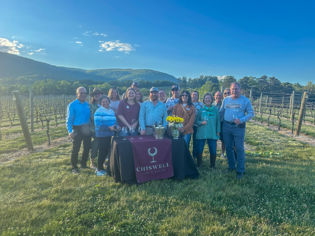 crown club members with mountain view in background