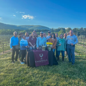 crown club members with mountain view in background