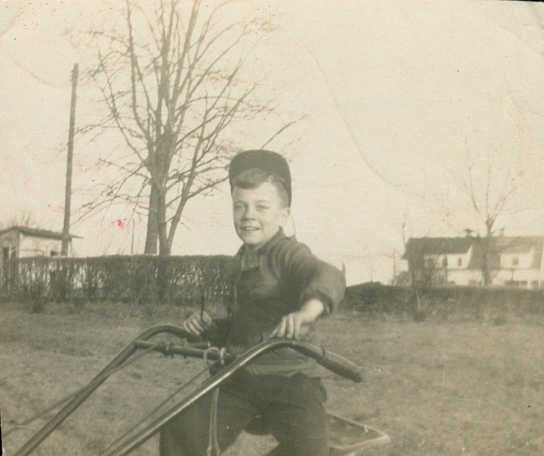 Henry as a childhelping on the family farm in the 1940s.