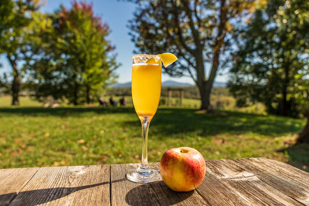 An apple cider mimosa outside.